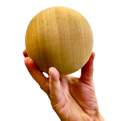Hand-turned 12cm bespoke wooden ball, natural finish, solid oak walnut or pine, UK-made decorative sphere