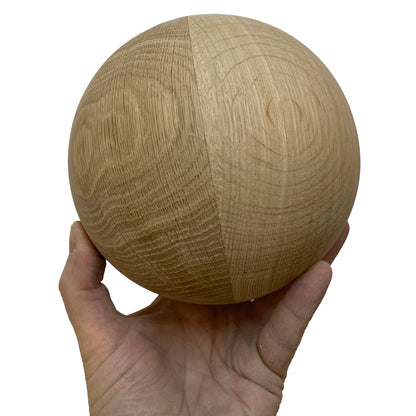 Hand-turned 13cm bespoke wooden ball, natural finish, solid oak walnut or pine, UK-made decorative sphere