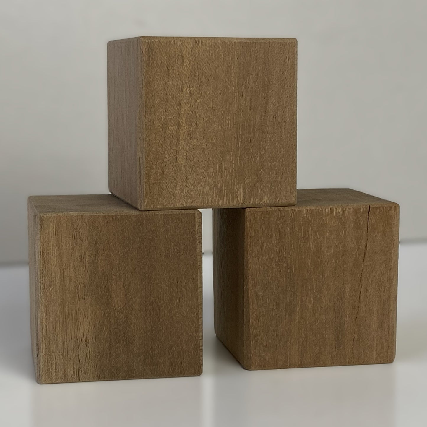 Solid 35cm natural wood cube, hand-finished smooth surface, UK-made display block