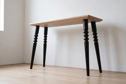 Adderley turned furniture legs, set of four - in context under a console