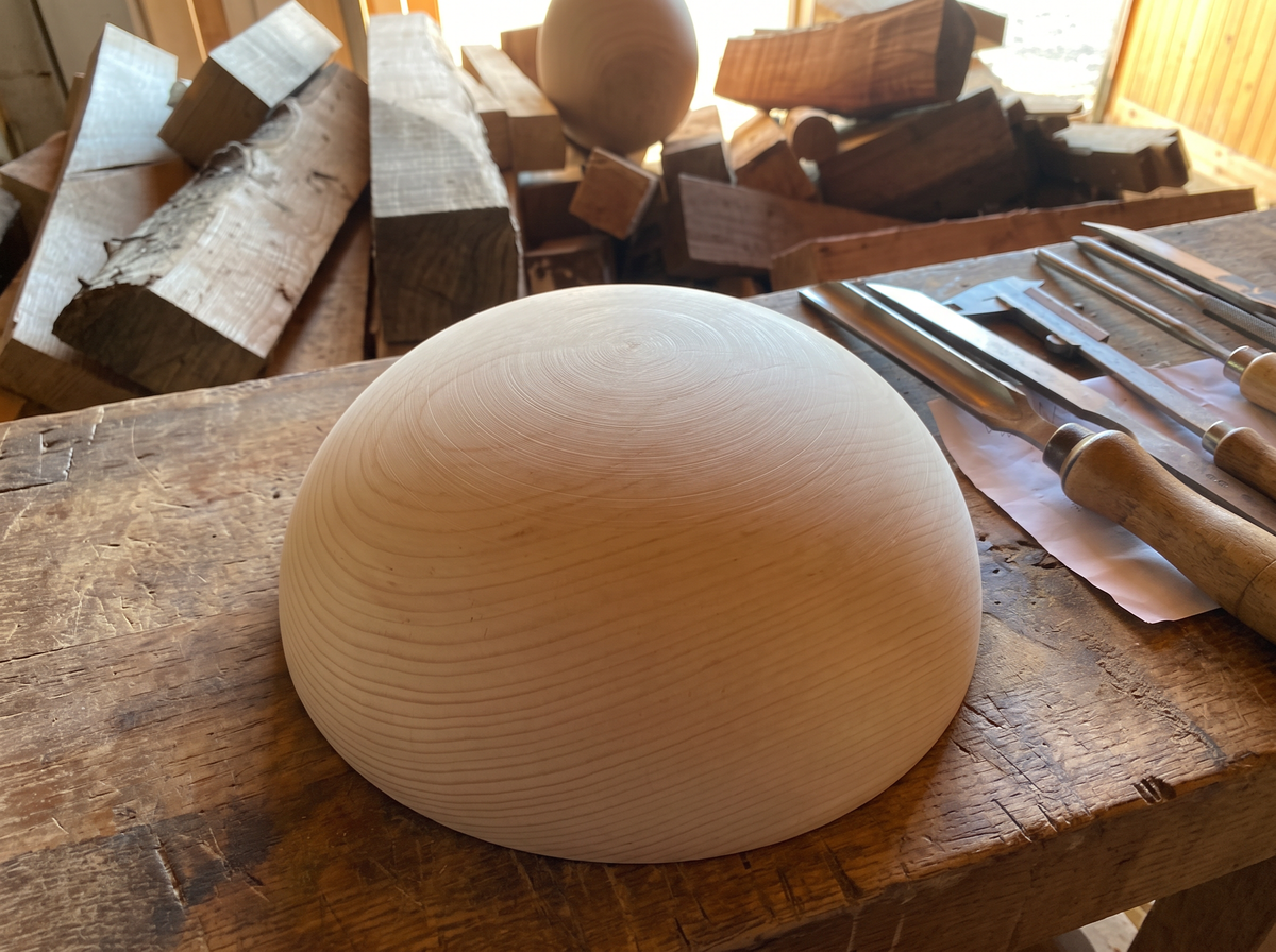 42 cm pine wooden hemisphere, hand-turned, on the workshop bench